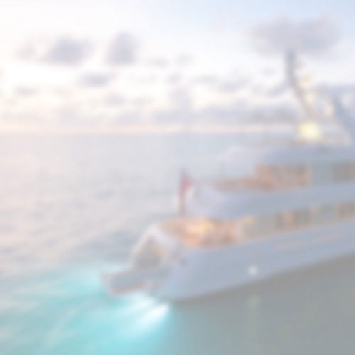Above the water image of a blurred boat using the light blue led light
