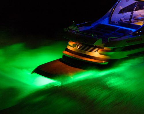 A boat travelling at fast speed using the green LED Light
