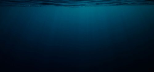 Below the dark blue sea