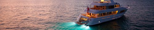 A banner image of the boat travelling in the sea using the light blue LED Light