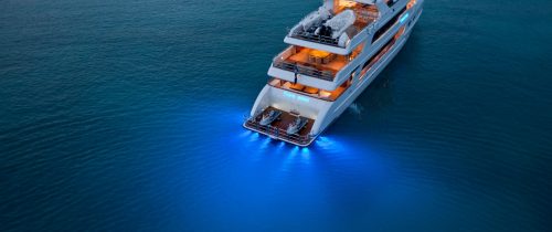 Superyacht in calm waters showing blue LED