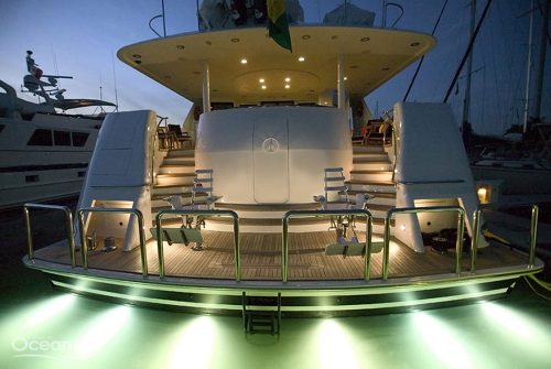 Stern of a superyacht lit up by LEDs