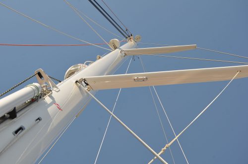 Looking up at mast lighting on Superyacht in day time