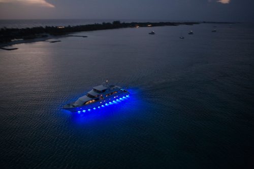 Looking down on a superyacht at dusk