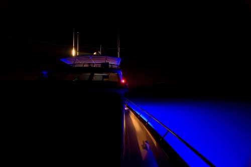 Superyacht lit up at night by LEDs