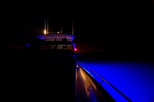 Superyacht lit up at night by LEDs